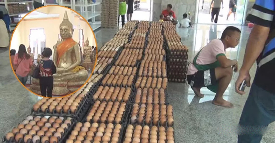多名中國人供奉20萬顆雞蛋在泰國沙通佛前，求戰勝新冠肺炎